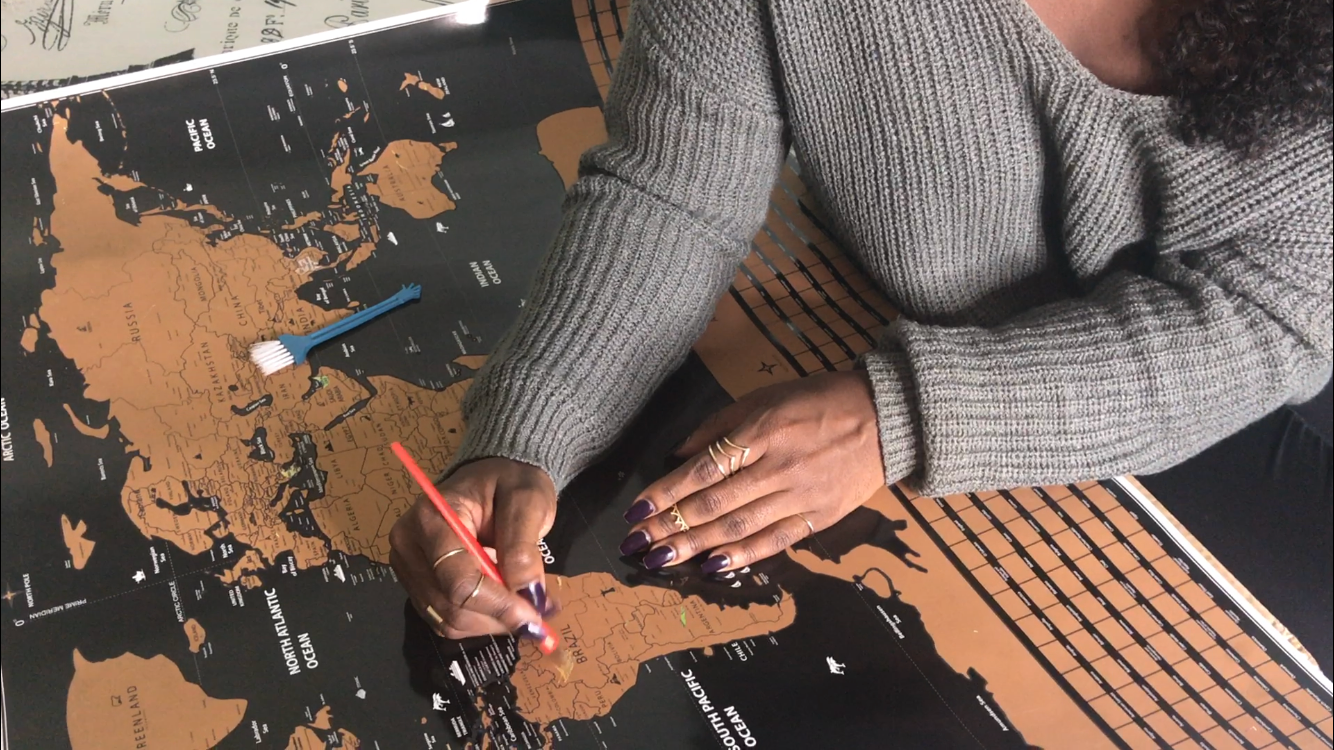 Scratch off world map stamped diary.PNG